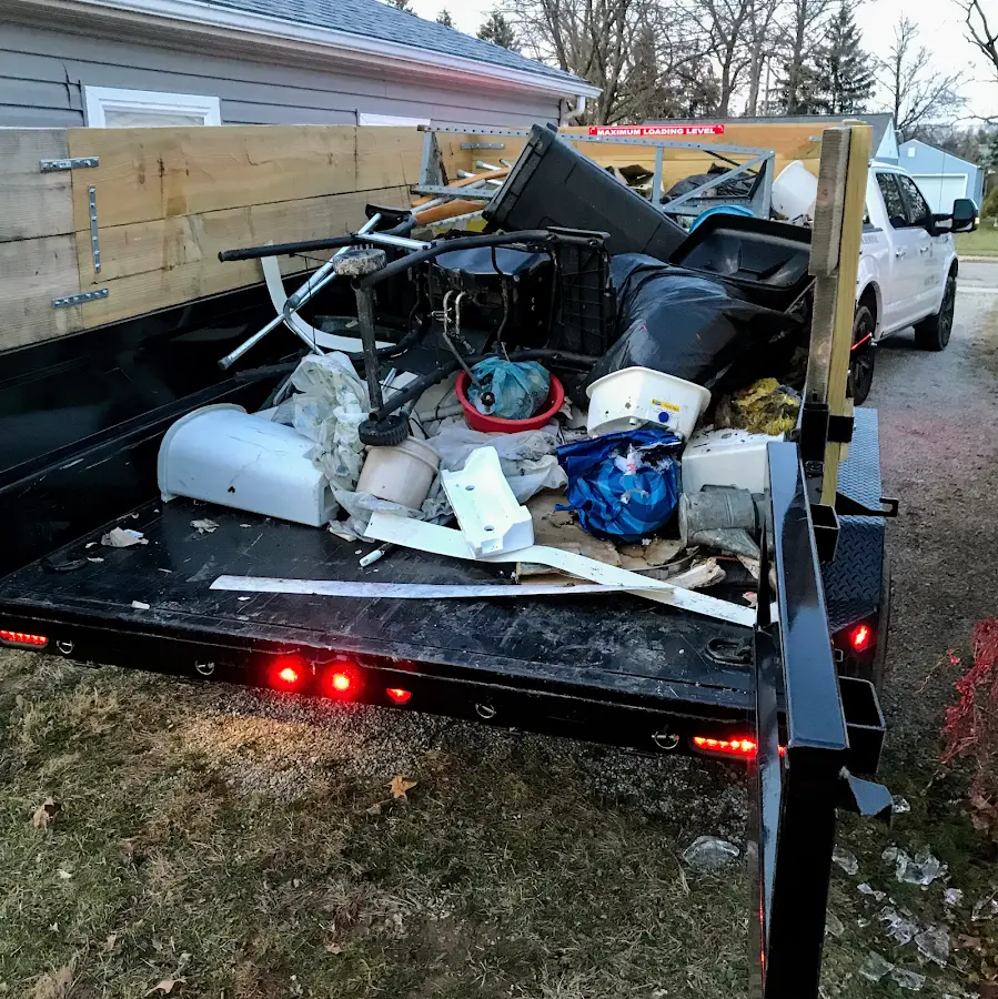 Roll-off dumpster delivered to a residential driveway in Winton