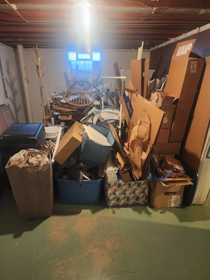 Roll-off dumpster container at job site for 8 Yard Dumpster Rental in Winton